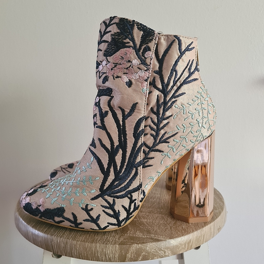 Floral embroidered mirror heeled boots